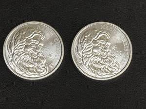 lot 96 image: 2024 Merry Christmas 1 oz Silver .999 Coins (Set of Two)