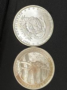 lot 103 image: Two 1 oz .999 Fine Silver Rounds Featuring Historical Themes