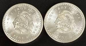 lot 105 image: Two Aztec Calendar 1-Ounce .999 Fine Silver Rounds Minted 1966