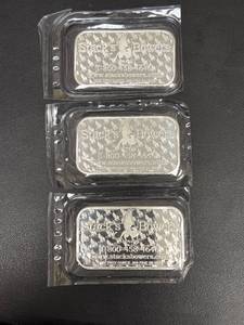 lot 112 image: Three 2022 Stacks Bowers 1 oz Silver Bars in Protective Packaging