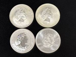 lot 115 image: Four 12 Troy Ounce Assorted Coins