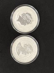 lot 122 image: 2014 and 2017 Australian 1 Dollar Silver Coins Featuring Koala and Christmas Designs