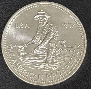 lot 129 image: 1987 Engelhard American Prospector 1 Oz Silver Round