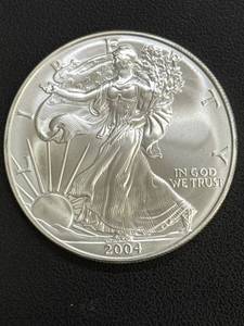 lot 43 image: 2004 American Silver Eagle Bullion Coin, .999 Fine Silver