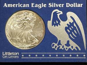 lot 57 image: 1997 American Eagle Silver Dollar in Littleton Packaging