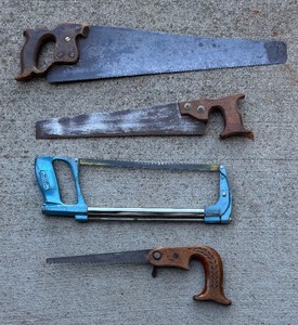 lot 187 image: Four Vintage Hand Saws
