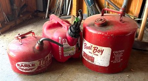 lot 193 image: 2 12 Gallon and 6 Gallon Gas Cans