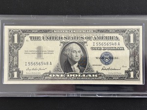 lot 8 image: 1957 Blue Seal $1 Dollar Silver Certificate Uncirculated
