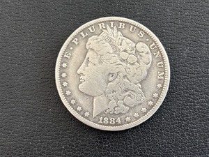 lot 65 image: 1884-O Morgan Dollar