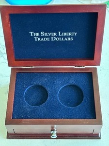 lot 88 image: Trade Dollar Case