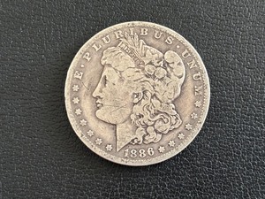 lot 109 image: 1886-O Morgan Dollar