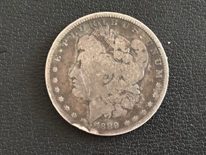 lot 114 image: 1889-O Morgan Dollar