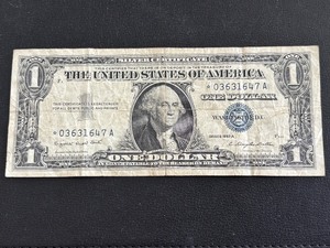 lot 155 image: 1957 A Blue Seal $1 Dollar Silver Certificate Star Note