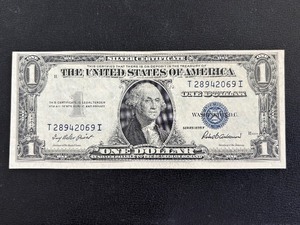 lot 157 image: 1935 F Blue Seal $1 Dollar Silver Certificate Uncirculated
