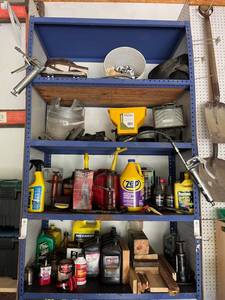 lot 63 image: Garage Shelving Contents - Hydraulic Jacks, Transmission Fluid, Power Steering Fluid, Grease Guns, Shop Light  and More