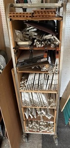lot 70 image: Vintage Rolling Bread Shelving Unit with Drawer Hardware, Clamps (70 T x 27 D x 19.5 W)