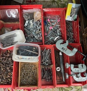 lot 99 image: Pipe Cutters, Construction Screws, Finishing Nails, and More