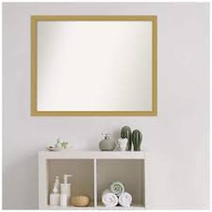 lot 23 image: Amanti Art Grace Brushed Gold Narrow 30 in. W x 24 in. H Non-Beveled Bathroom Wall Mirror in Gold  Customer Returns See Pictures