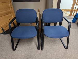 lot 32 image: MSRP $1,110 HON Solutions 4000 Series Guest Reception Chairs  Set of 2 in Navy Wide Cushions for Comfort & Support  Durable Steel Frame with Stain-Resistant Upholstery  Great For Waiting Rooms, Lounges, Offices  Excellent Condition
