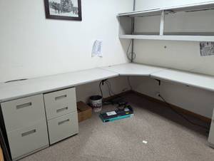 lot 13 image: MSRP $5,500 HON Workstation with 3 File Cabinets and 2 Overhead Cabinets. HONs smart, flexible design offers a strong balance of structure and adaptabilityideal for supporting different work styles in both open and traditional office layouts.