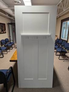 lot 43 image: Heritage Millwork Custom 2-Sided Fiberglass Exterior Door  30x68, 3-Panel with Decorative Dentil Shelves Use as Functional Door or Accent Piece. Hard to Find Outside Dealer Channels  Unique, High-End Look