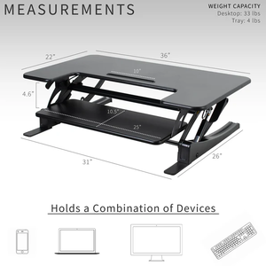 lot 51 image: MSRP $200 Vivo V Series Standing Desk Converter  Dual-Tier Design with Removable Keyboard Tray for Custom Comfort. Adjustable Height from 6.5 to 17 Lets You Switch Easily Between Sitting & Standing to Boost Comfort and Reduce Fatigue.
