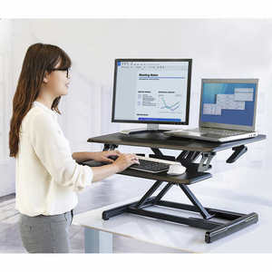 lot 48 image: MSRP $360 Seville Classics airLIFT Adjustable Sit To Stand Desk Converter. Features Dual Monitor Support, Keyboard & Mouse Tray, Built-in Tablet Stand, and Space-Saving Vertical Lift. Steel Frame with MDF Top- Electronics NOT included