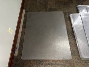 lot 57 image: Set of 4 Chair Mats  Mats May Need Flattening. Durable Vinyl with Anti-Skid Surface. Roll Smoothly While Protecting Your Floors