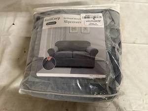 lot 40 image: FestCort Section Stretch Slipcover