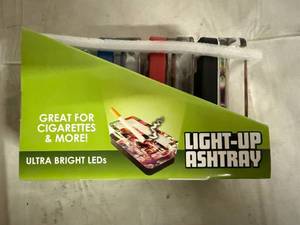 lot 47 image: 4 Pack of Light-Up Ash Trays