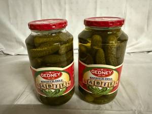lot 131 image: 2 Jars of Gedney Baby Dill Pickles