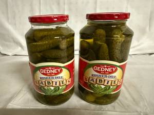 lot 134 image: 2 Jars of Gedney Baby Dill Pickles