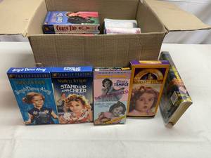 lot 17 image: Box Full of Shirley Temple VHS Tapes & others