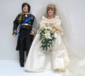 lot 54 image: Danbury Mint Princess Diana & Prince Charles Porcelain Wedding Dolls