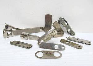 lot 102 image: Group of Assorted 1930s era Cigar Cutters