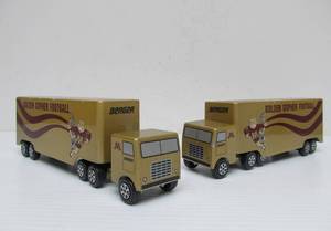 lot 105 image: Pair of Vintage UNIVERSITY of MINNESOTA Cast Metal Promotional Trucks by Ralstoy