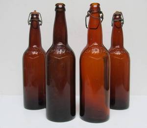 lot 108 image: 4 Large Old Embossed Glass GRAIN BELT Advertising Beer Bottles