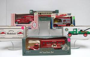 lot 128 image: Lot of 6 Mint in Box Cast Iron Truck Coin Banks