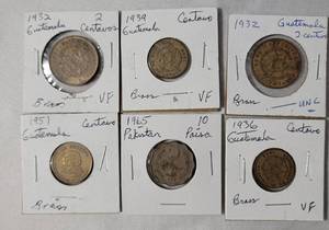 lot 64 image: Coins from Guatemala (5) and Pakistan (1)