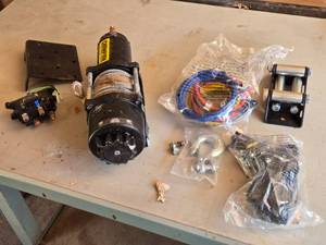 lot 19 image: Champion Power Equipment 4000 lb ATVUTV winch - Appears Unused
