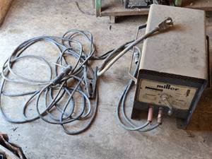 lot 26 image: Miller Model M-180 Welding Machine Untested
