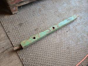 lot 65 image: John Deere Cultivator Arm approximately 47 inches.