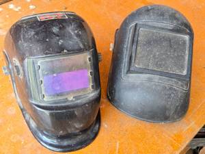 lot 97 image: Lot of 2 Welding Helmets one with an auto-darkening