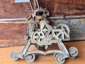 lot 145 image: Antique Cast Iron Hay Trolley Pulley System