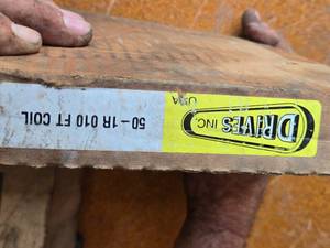 lot 150 image: Roller Chains - Drives Inc., labeled 50-1R 010 FT COIL. and a used Set marked 60 RC USA