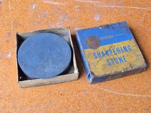 lot 153 image: Round Norton Product Sharpening Stone in Box