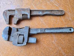 lot 176 image: Pipe Wrenches one marked Made in USA and Auto.