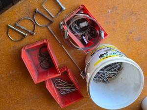 lot 198 image: Lot of Miscellaneous Hardware Items such as cotter pins, hose clamps, hitch pins, and retaining rings