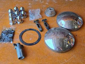 lot 205 image: Semi Lug Nut Covers, Hood Latches, Hub Caps