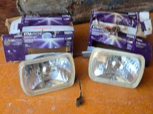 lot 208 image: Sylvania XtraVision H6054 Automotive Headlights - Appear to be Used, Look Like May Have New Bulbs